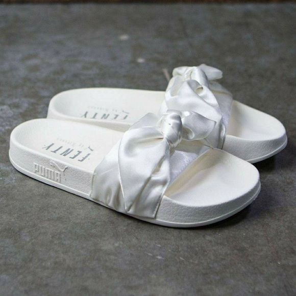 clear and white leadcat jelly puma slides